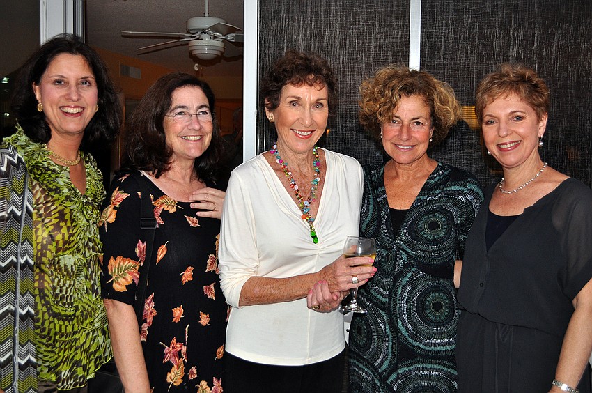 Carolyn Setlow, Dinny Gruen, Lois Lesser, Emily Ettlinger and Marcie Setlow pose together on the back porch of Lesser's home. Setlow and Setlow are Pearson's nieces and Gruen and Ettlinger are cousins of Pearson.