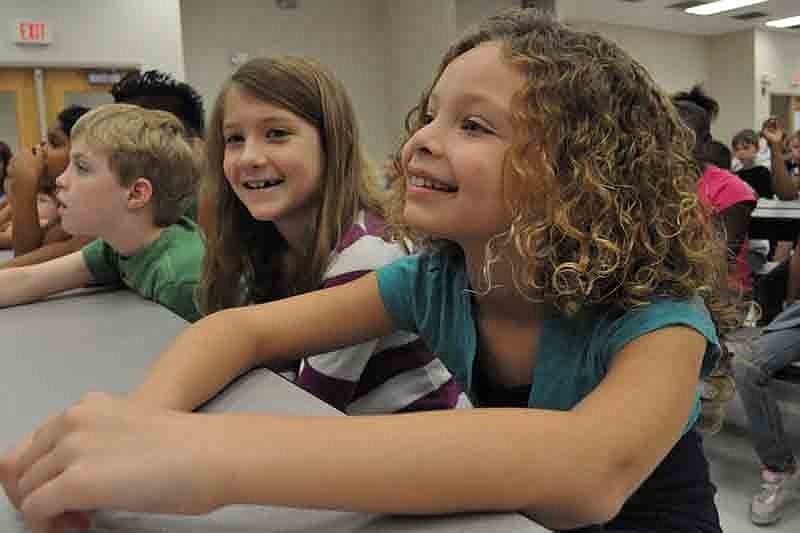 Sofia Pagan, 8, eagerly watched veterans fold the American flag.