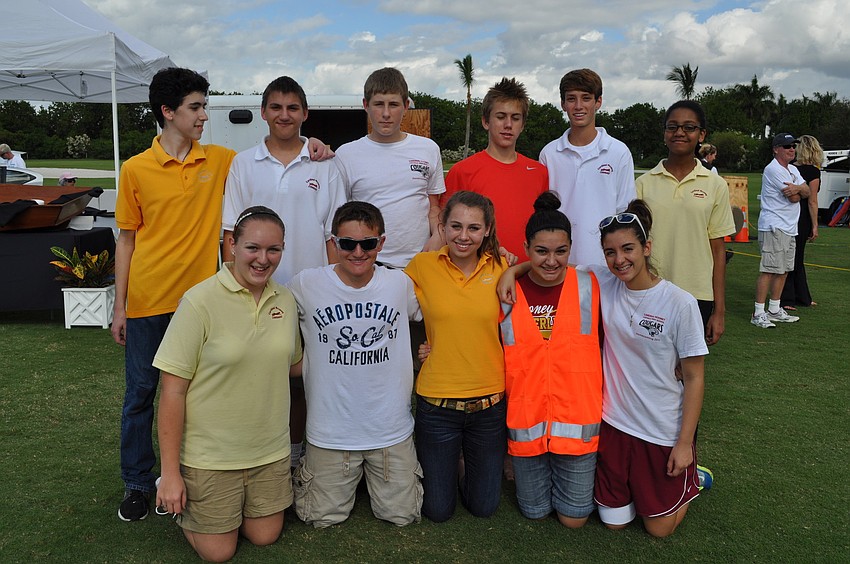 Cardinal Mooney Freshman volunteers. Front Row: Amanda Swalby, Nicholas Pelletier, Kellie Holohan, Maggie Mayhew and Delane Toussaint. Back Row: Victory Trouy, Michael Gula, Tommy Rao, Mitch Gannon, Michael Staikos and Rosemay Rodney.