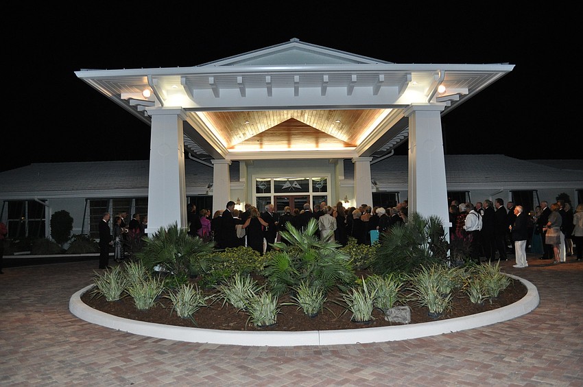 Members of the Bird Key Yacht Club wait for the doors to open