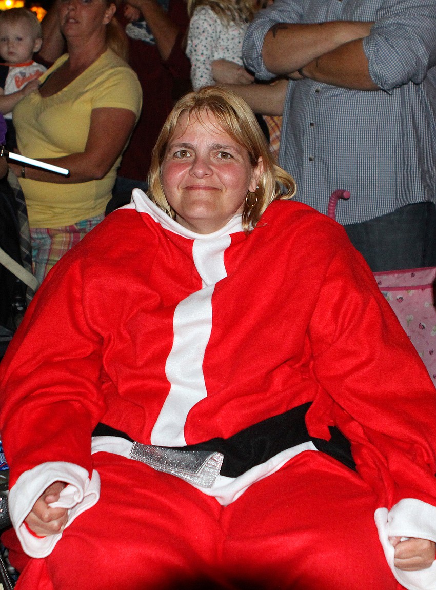 Joy Moder wore a Santa themed snuggie to keep warm during the parade.