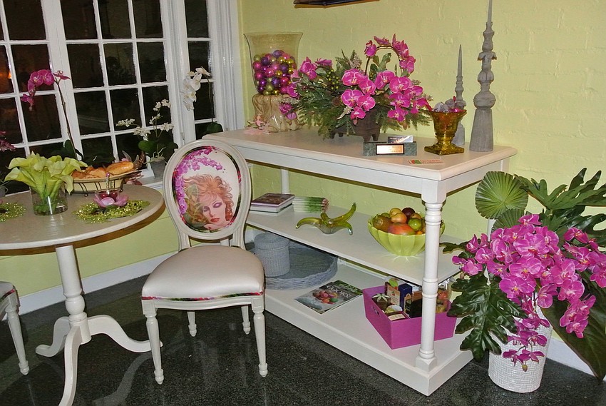 The pink-and-green solarium was designed by Cheri Pachter-Neary.