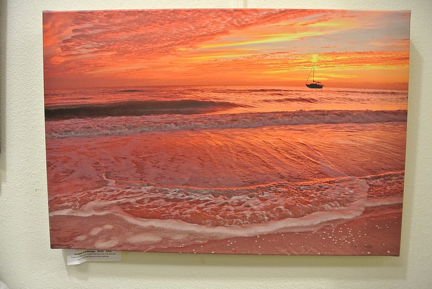 This painting is titled â€œSunset Anchorage.â€