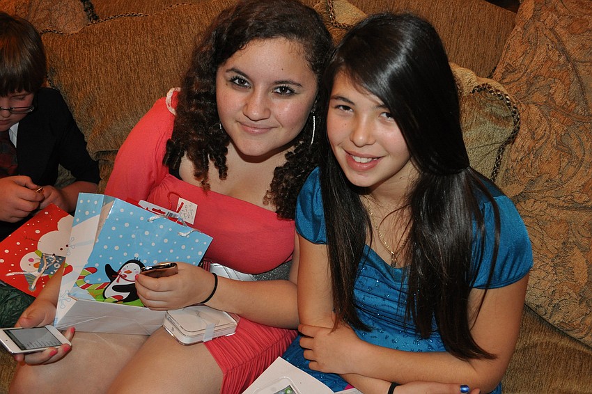 Jasmine Rossa and Paige Bobzin said they were grateful for their gifts and the opportunity to attend the party.