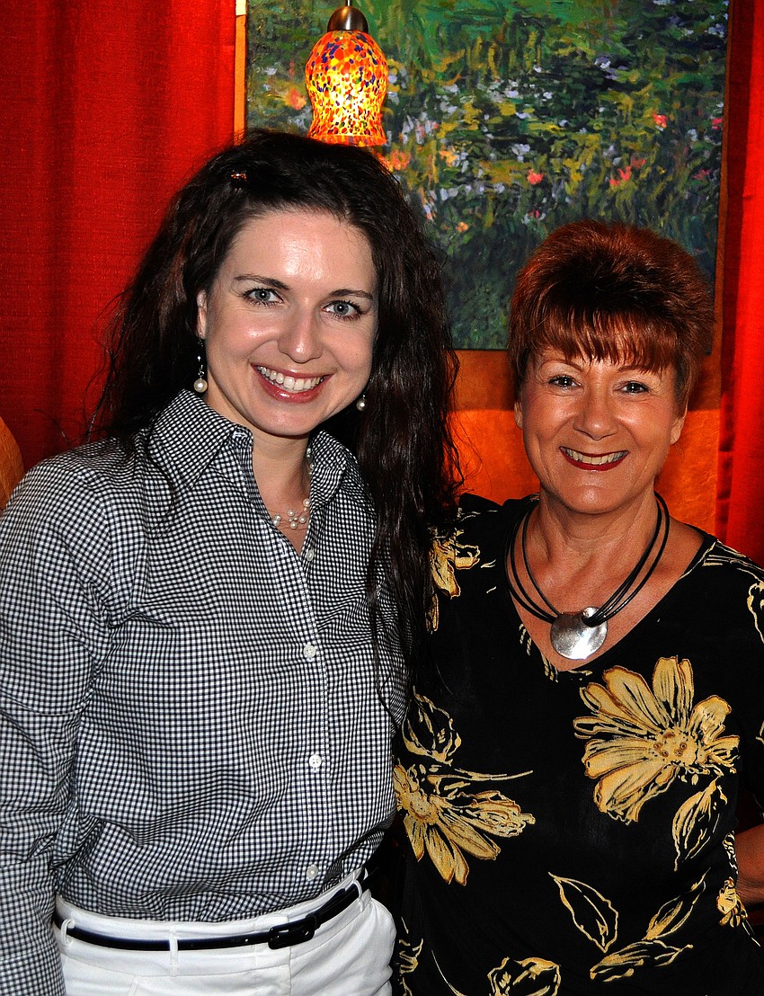 Olga Ovchiyan and Nelly Camardo pose together Tuesday, Sept. 6 during the YES luncheon at Claytonâ€™s Siesta Grille on Siesta Key.