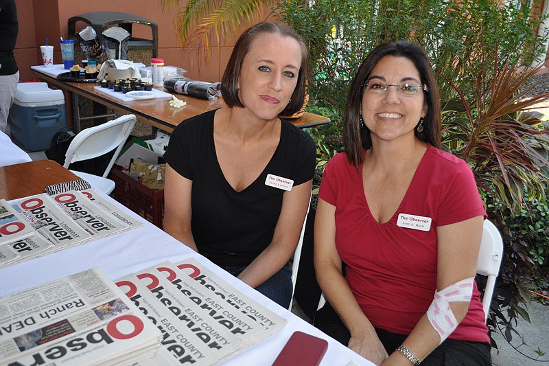 Observer Group representatives Susan Leedom and Lori Ruth were eager to greet guests.