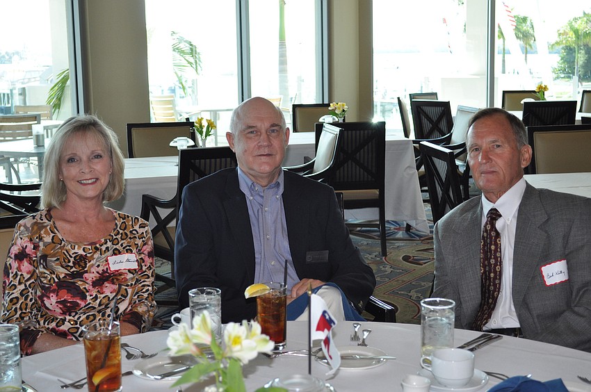Linda Stewart, Commissioner Phillip Younger and Bob Kelly