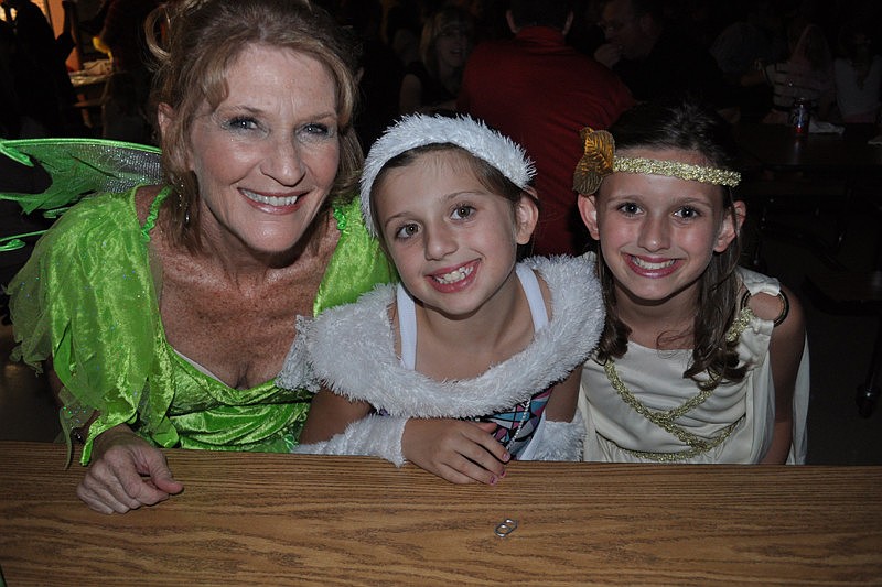 Debbie Baker ate dinner with her granddaughters, Abby and Kira Burch.
