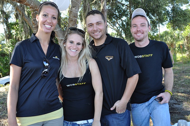 Tegan Foster, Megan Smith, Cody Vera and Tyler Robideau served beer samples for World of Beer.
