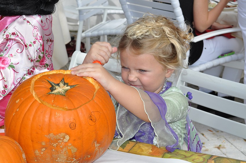 Ashley Vallrugo concentrates on her creation