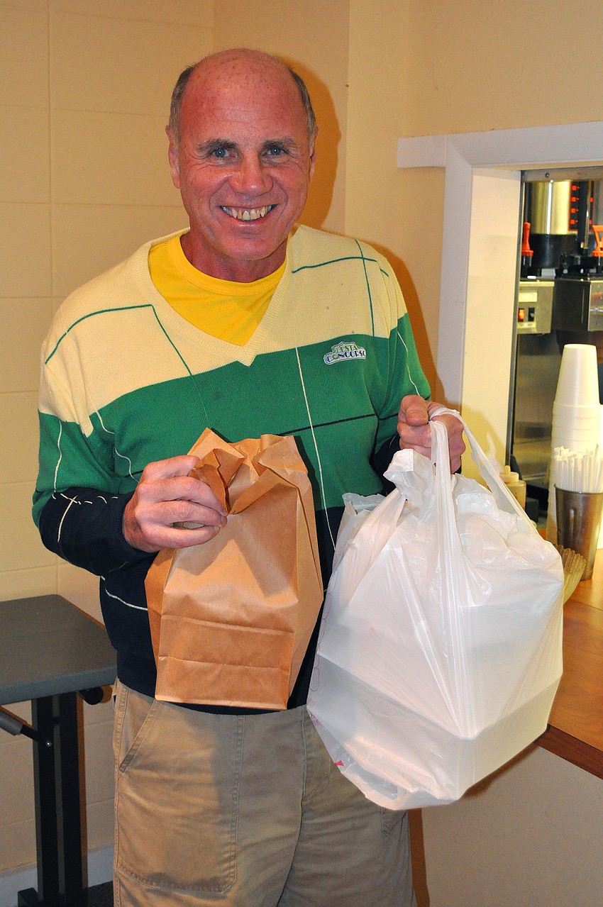 Bill Russell took his dinners to go.