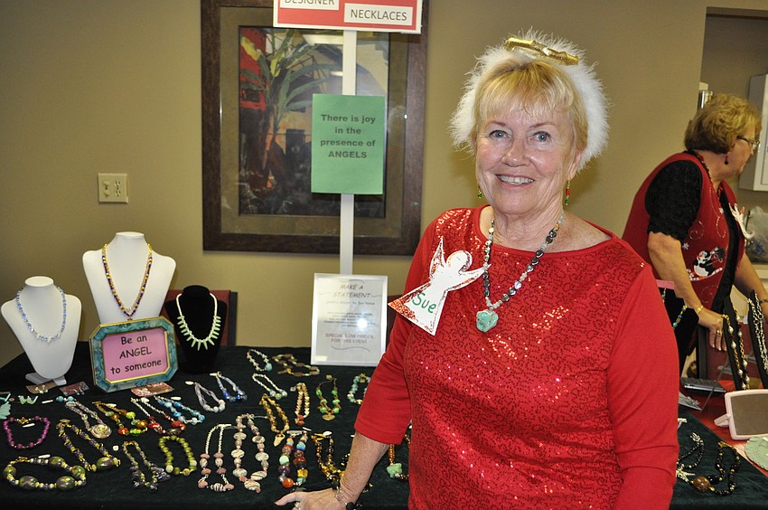Co-Chairs of the event Jan Herman and Valarie Evanko stand with Event Coordinator Sue Reese.
