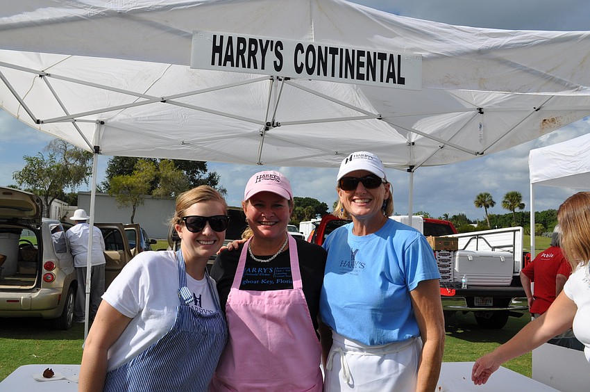 Mallory and Kim Hoatland with Owner Lynn Christensen manning the Harry's Continental Kitchens booth.