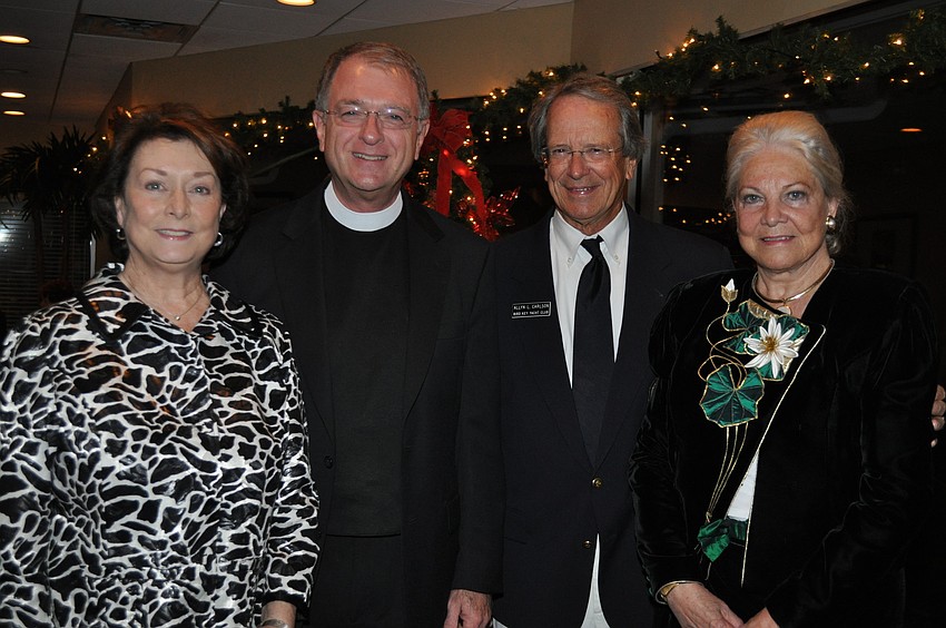 Linda and Rev. Fred Robinson of Church of the Redeemer Episcopal with Maxine and Fleet Captain Allyn Carlson