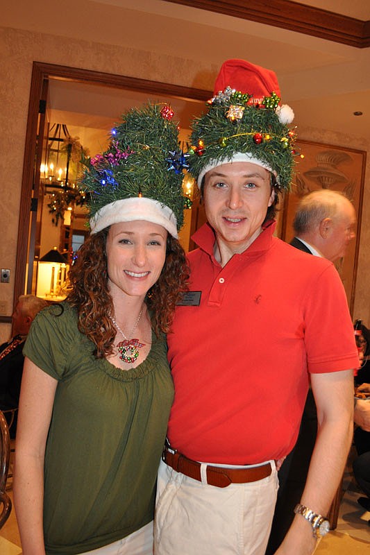 Stephanie White and Chris Lind wore similar hats.