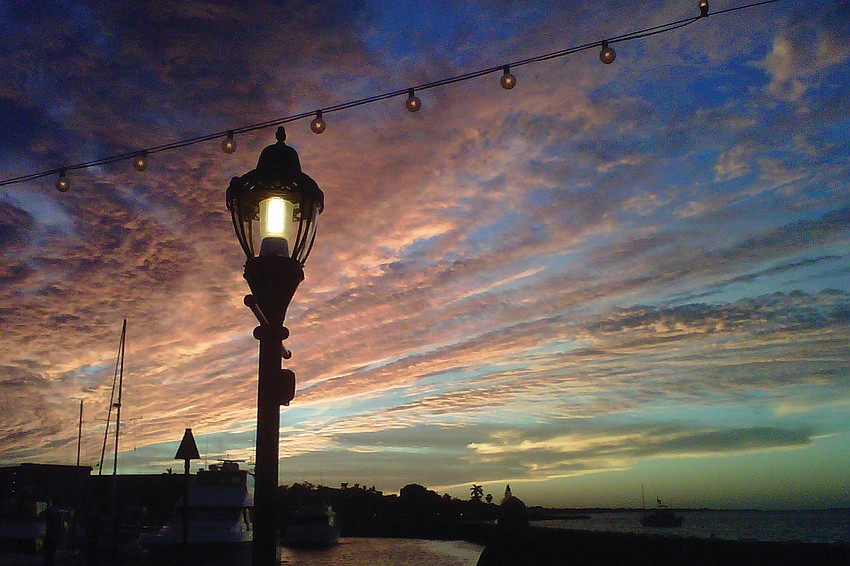 Dinner by the River: Cathy Woolley took this sunset photo in the Bradenton Marina at Pier 22.