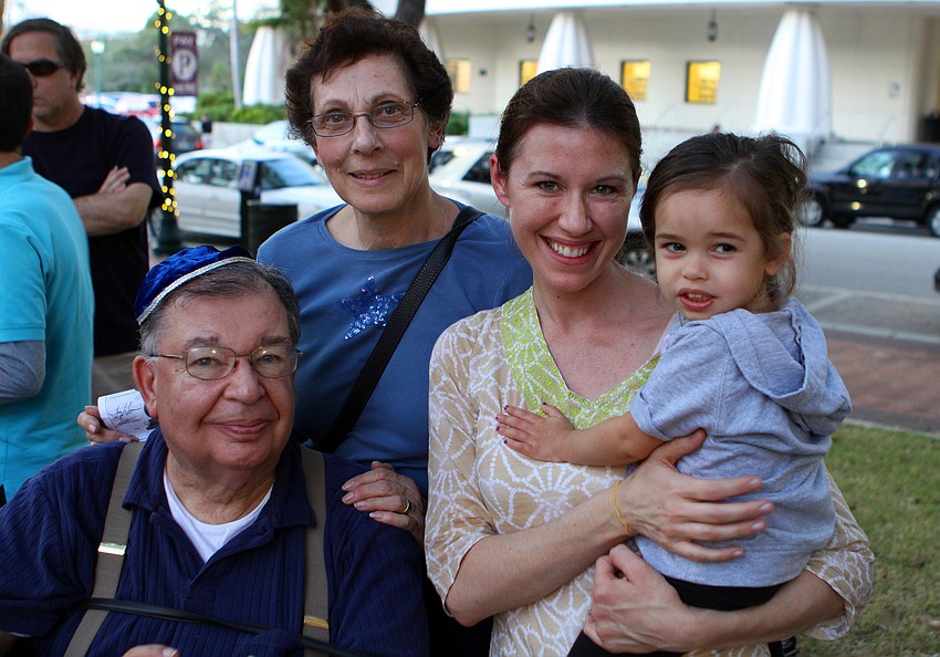 Alan and Joyce Hersh with Lauren and Lillian, 3, Hersh at A Taste of Chanukah, Tuesday, Dec. 20 at Five Points Park.