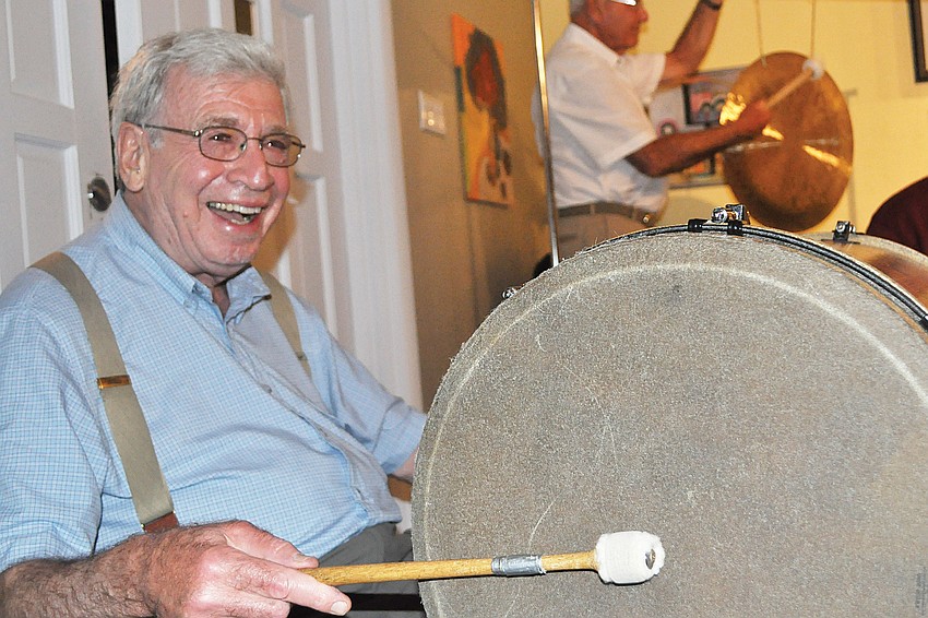 Harvey Golombek enjoyed playing the drum in March at the 