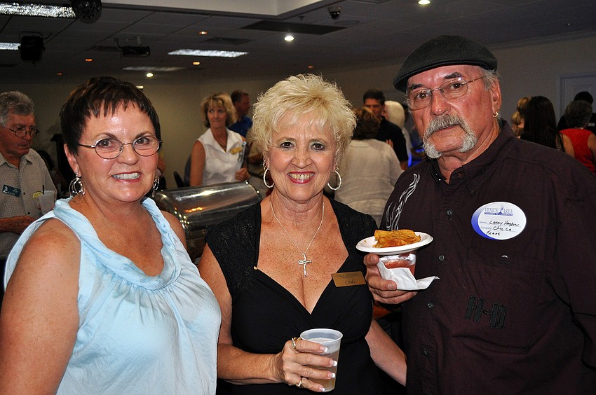 Gay McCarthy poses with Cindy and Larry Hayden
