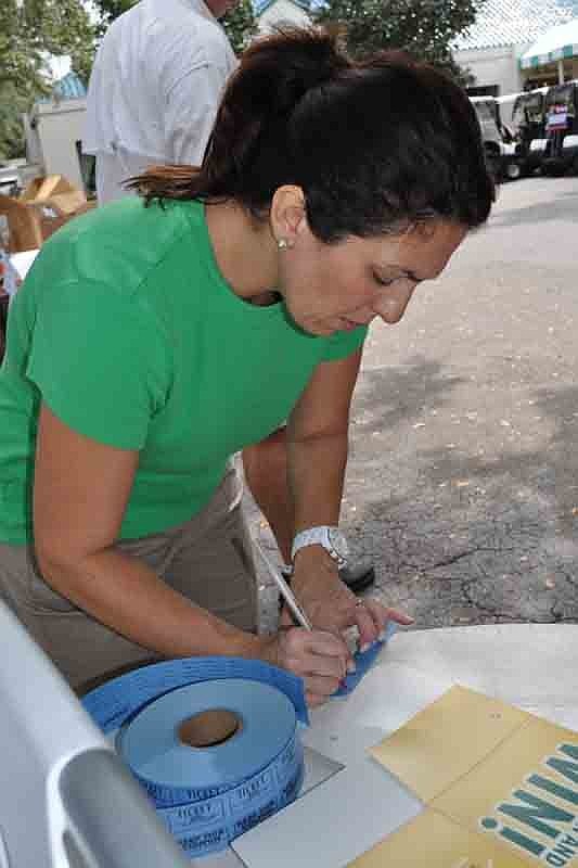 Nattaly Perez took raffle tickets.