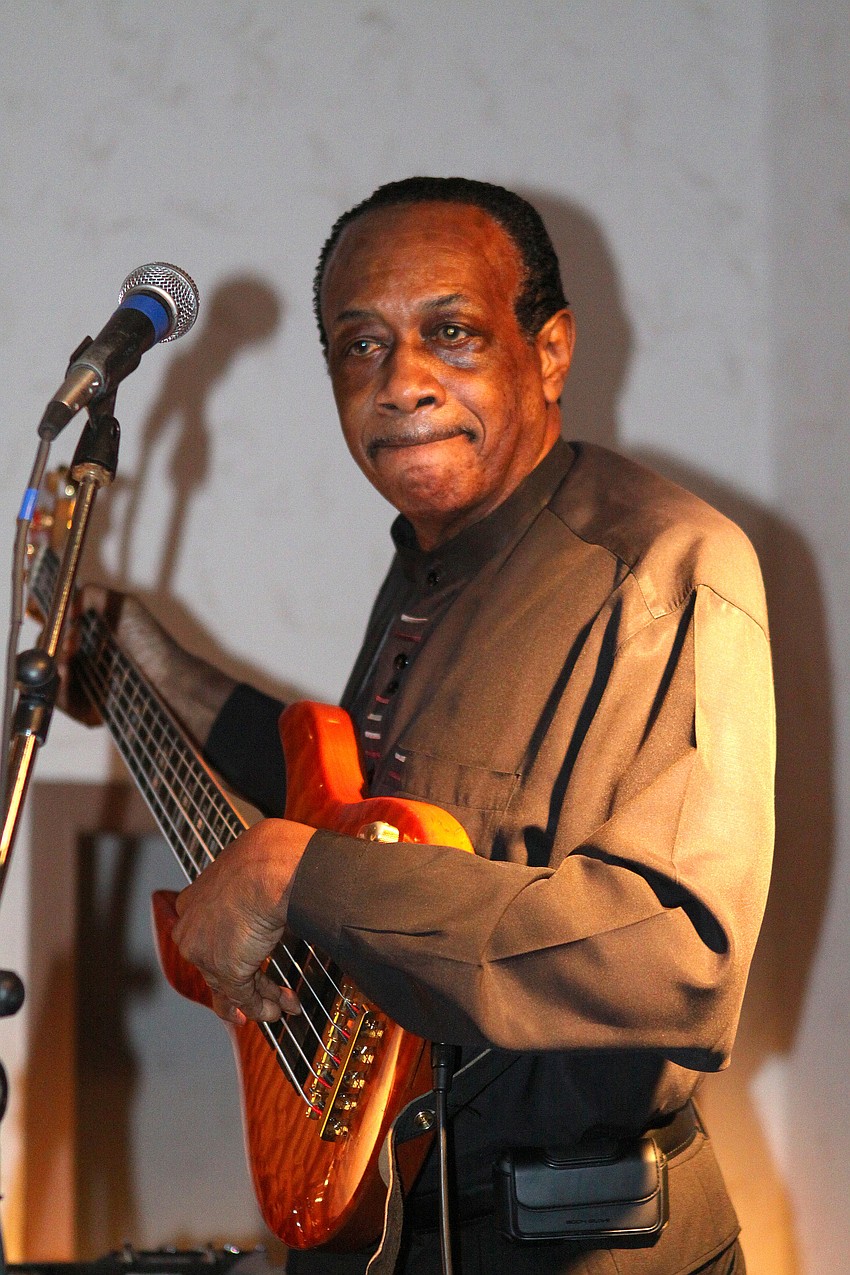 Henry D. Hart Sr. plays the bass guitar as part of Soul Sensations.