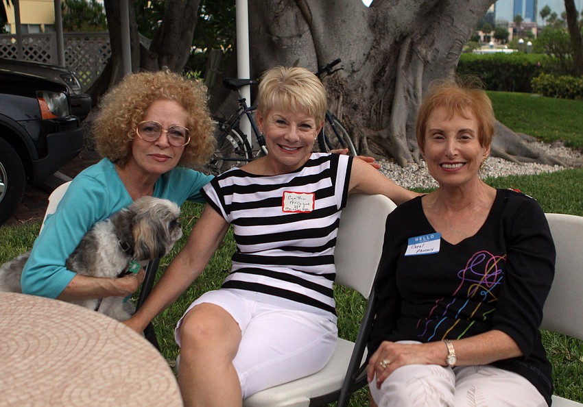 Ellen VanDernoot with her dog, Dusty, poses with Cynthia McCague and Carol Green