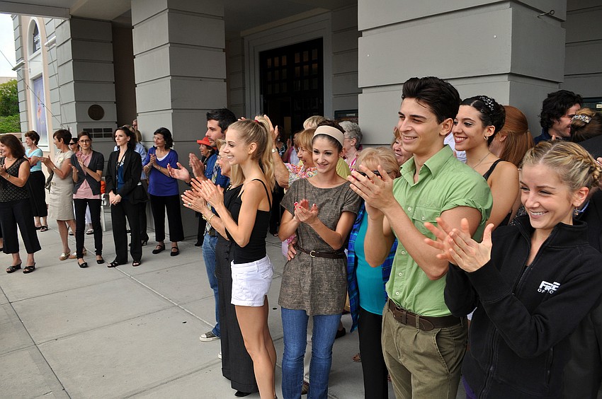 Dancers and Friends of the Ballet clap as the limos arrive in front of the FSU Center for the Performing Arts.