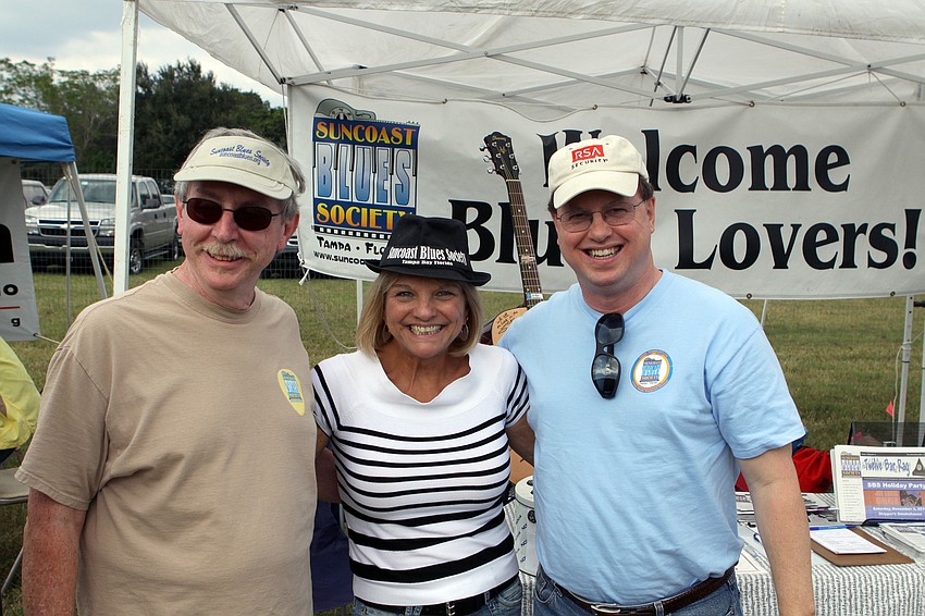 Tom Carter, president of the Suncoast Blues Society, Kathe Moore and Bill Hampton