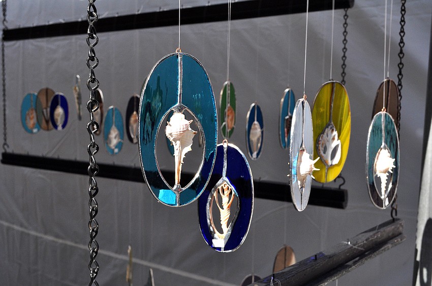 Pretty shell and glass window ornaments created by John DiCarlo