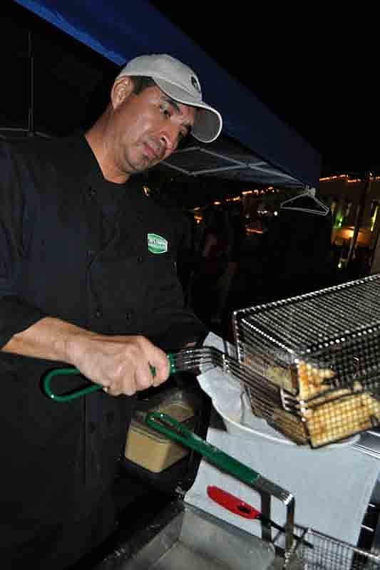 Hector Gutierrez prepared fish and chips for hungry patrons.