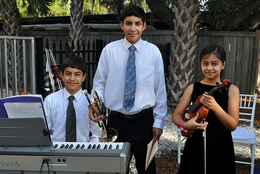 Joshua, 11, Jose, Jr., 17, and Andrea, 10, Guaita were the musical entertainment for the event.