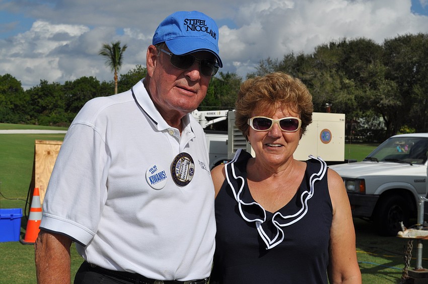 Woody Wolverton and Therese Richter. Richter won a putter.