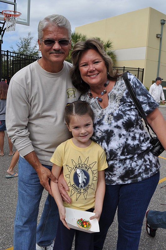 Kiley Kaliher, 7, came out with her grandparents, Dan and Heidi Center.