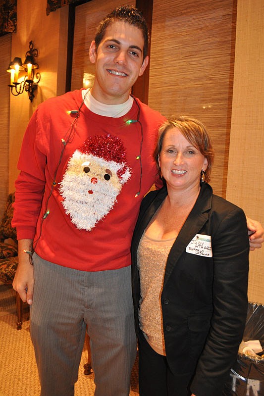 Tom Lloyd of M&I Bank with Judy Athari of Buffalo Lodging