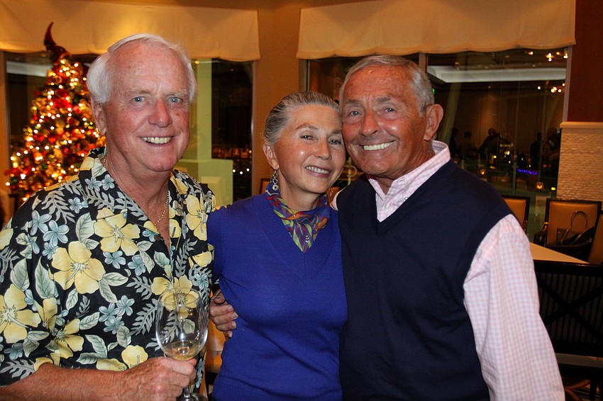 Anthony Manifold poses with Pat and Mike Frain, Thursday, Dec. 8 at the Observer Cup Challenge Cocktail Party at the Sarasota Yacht Club.