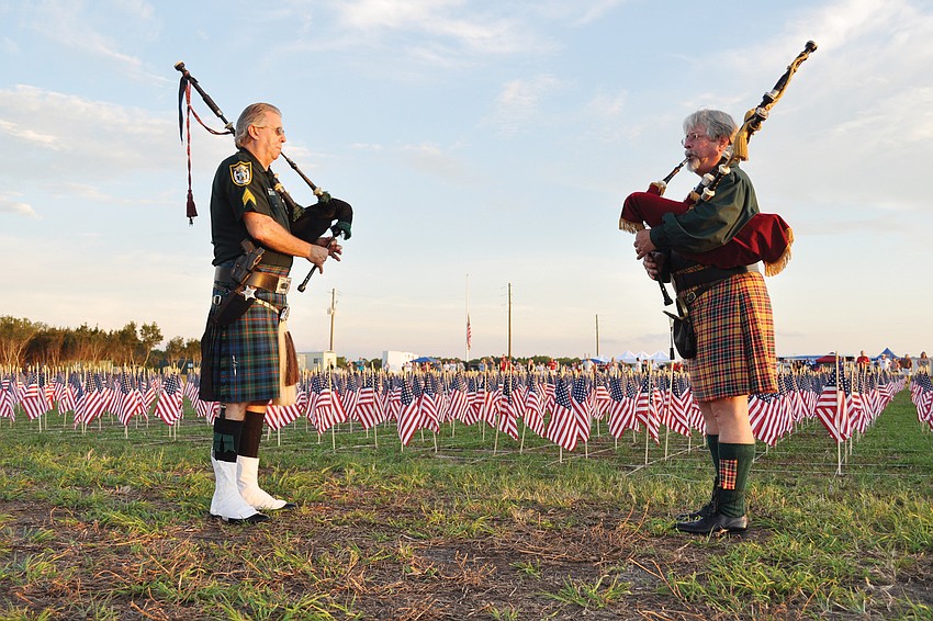 Bagpipers led a silent procession of emergency vehicles during the LWR Remembers 9/11 event Sept. 10 at Premier Sports Complex. Published Sept. 15, 2011.