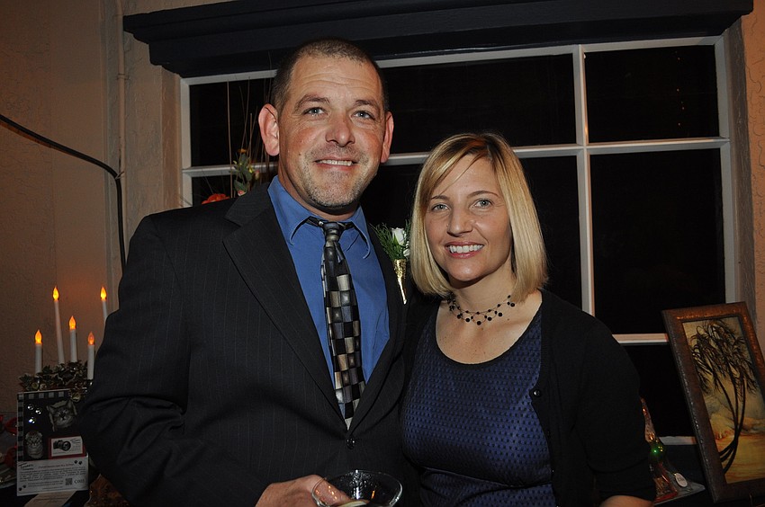 Honored veterinarian Dr. Erik Walker and Whys Miller