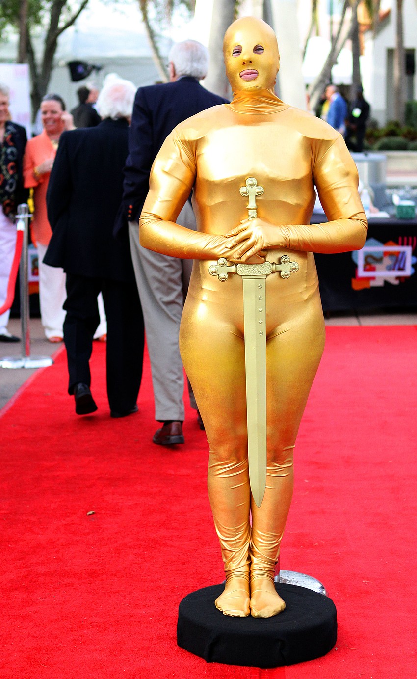 Dr. Jennifer Awe, Associate Dean of Students at Ringling College, posed on the red carpet as Oscar.