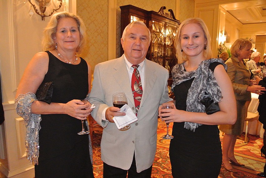 Laura Plum with Chuck and Alex Margetta