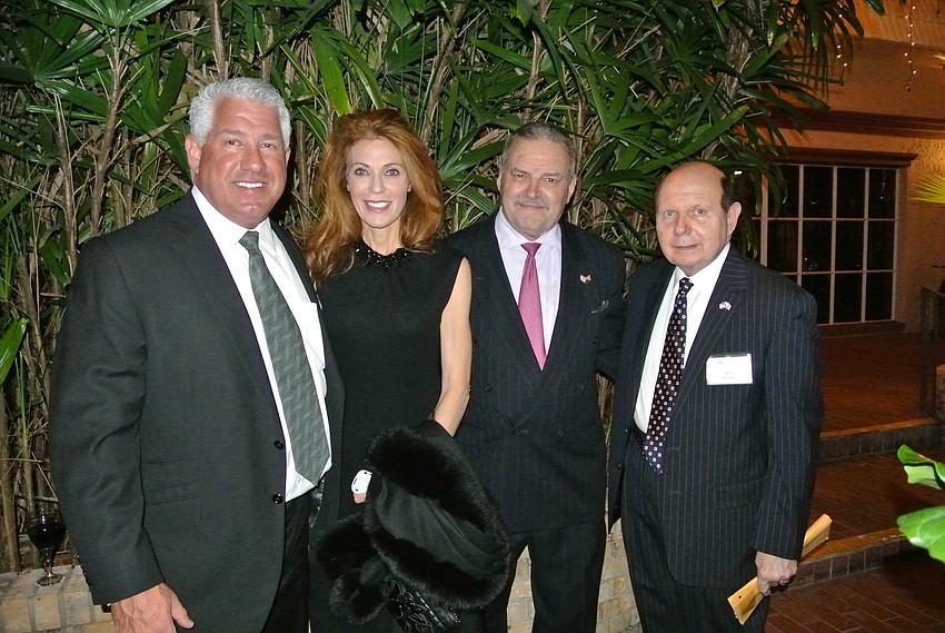 Dr. Gary and Elizabeth Kompothecras, Dr. Michael Meriweather and Robert Schwartz