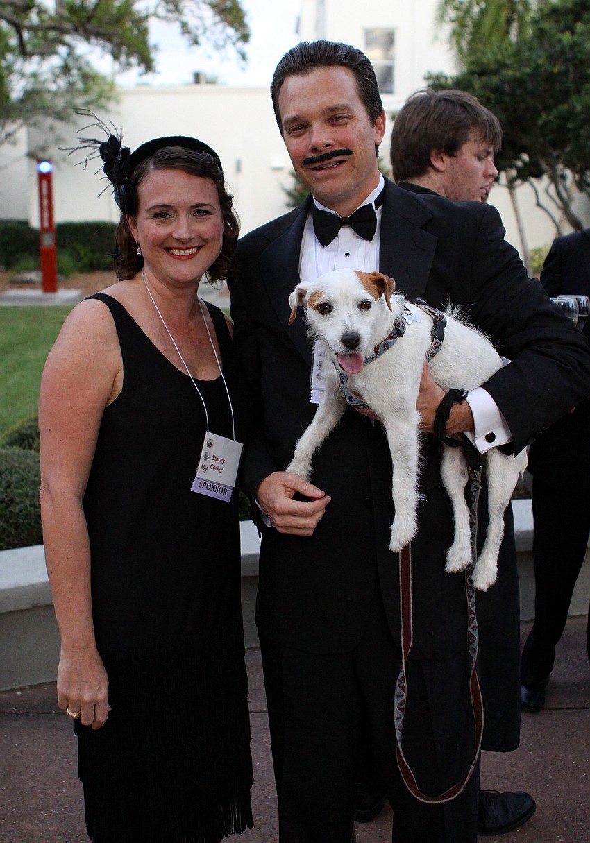Stacey and Michael Corley with their dog, Pipi, came as the stars of The Artist.