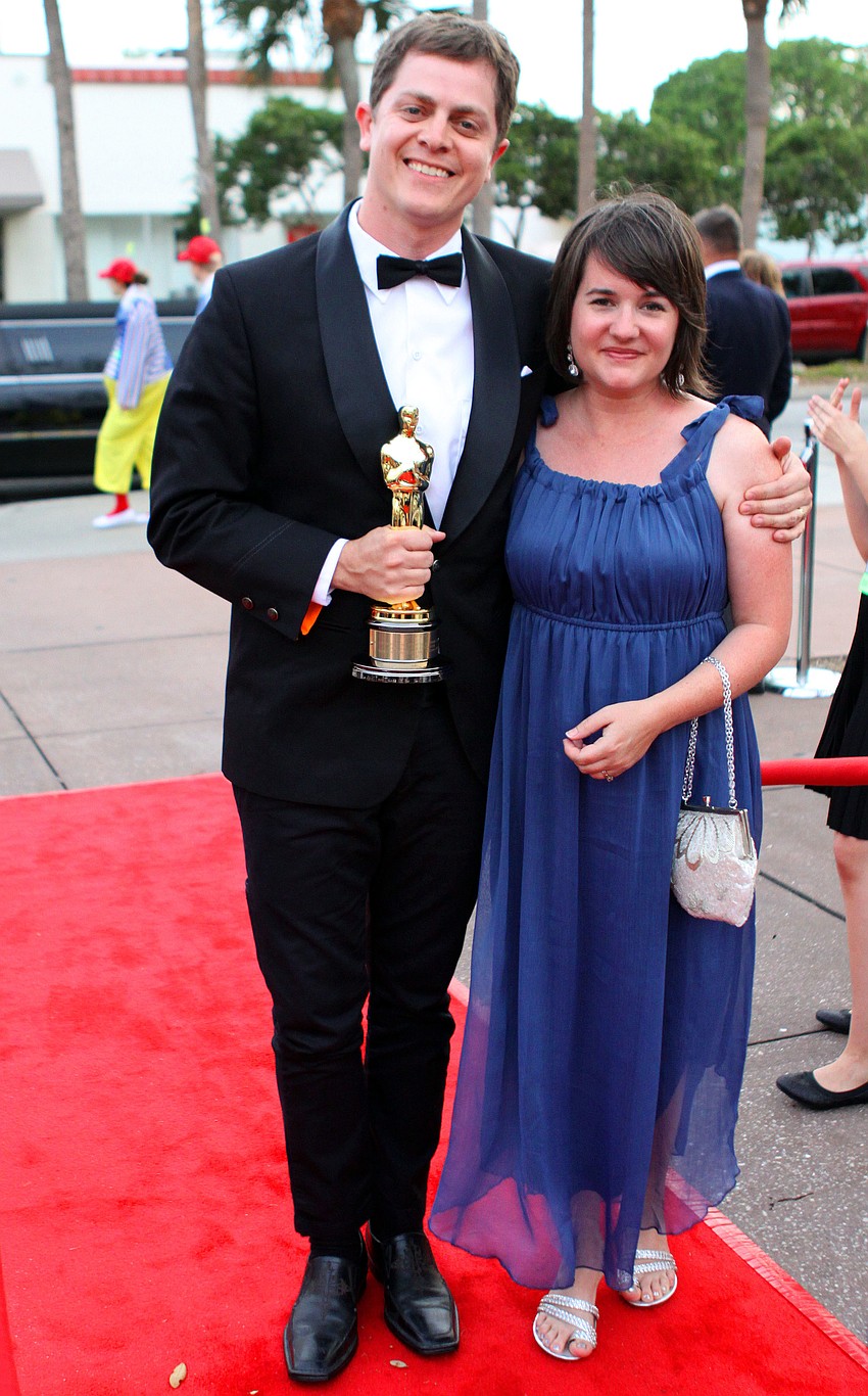 Brandon and Shannon Oldenburg pose with Brandonâ€™s recently won Oscar.