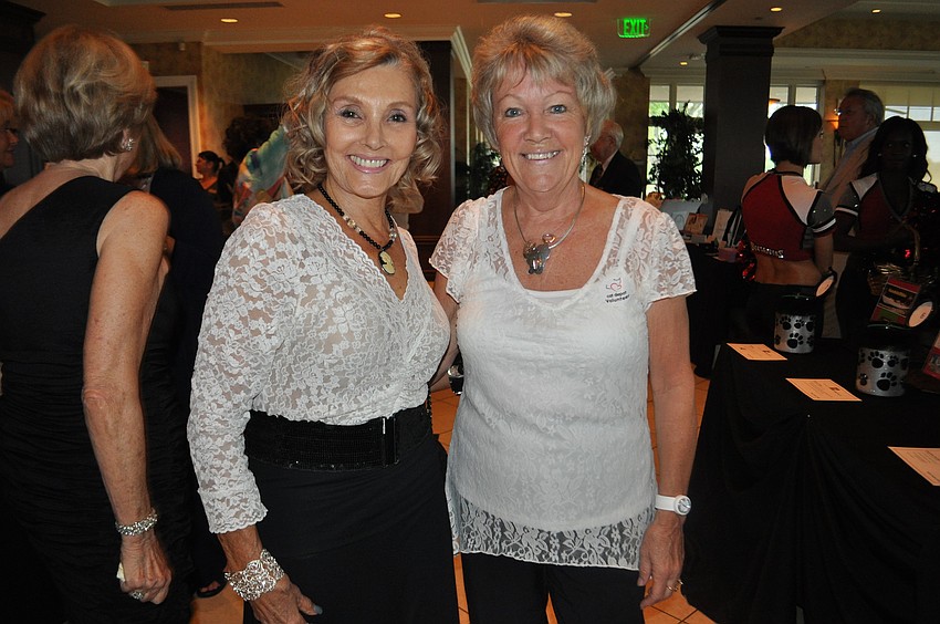 Thomas Mathews dealing to Dawn and Bob Schnuck