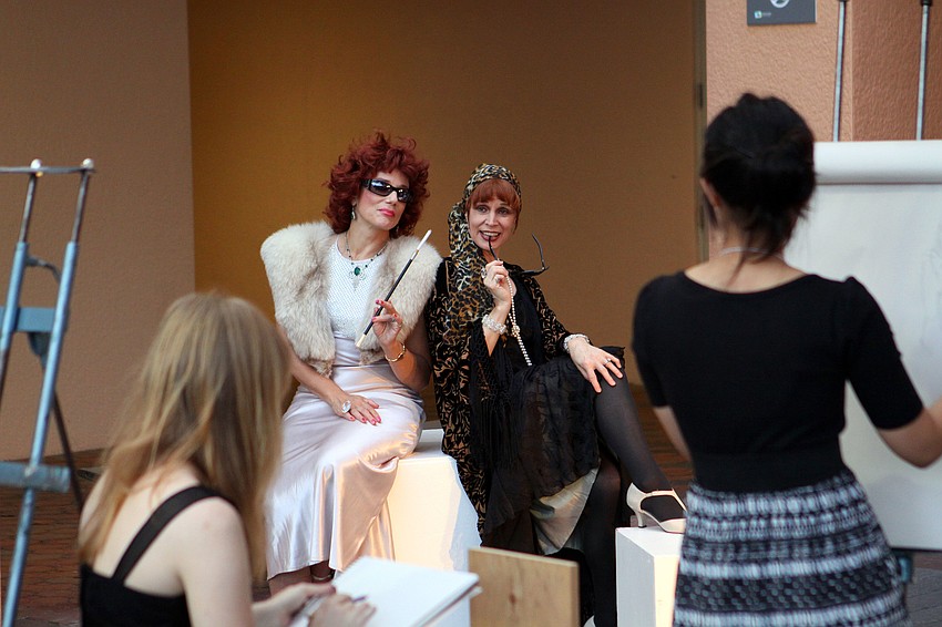 Seva Anthony and Ann Morrison were more than happy to model for the Ringling art students, Saturday, March 24.