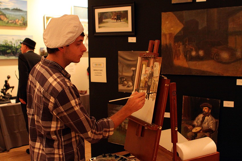 Mirald Cake paints inside Ringling during 'An Evening at the Avant-Garde.'