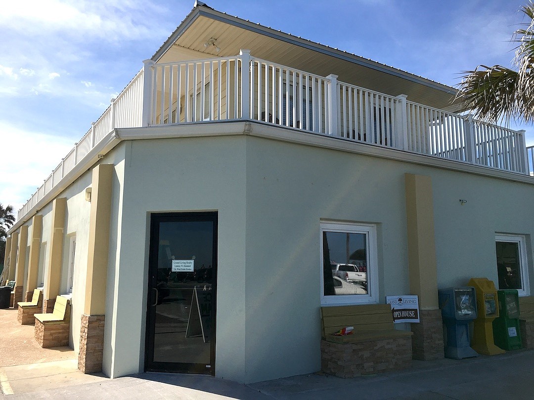 The office, located on the second floor of 316 Oceanshore Blvd., is newly renovated, and Grand Living Realty shares the space with staff from Coquina Construction and Southern Title. Photo courtesy of Meredith Rodriguez