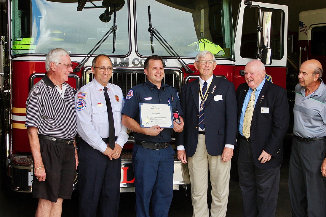 Palm Coast firefighter-EMT Travis Greco was awarded the 2018 Fire Service Medal and Certificate by the Flagler Chapter of the Sons of the American Revolution. Photo by Ray Boone