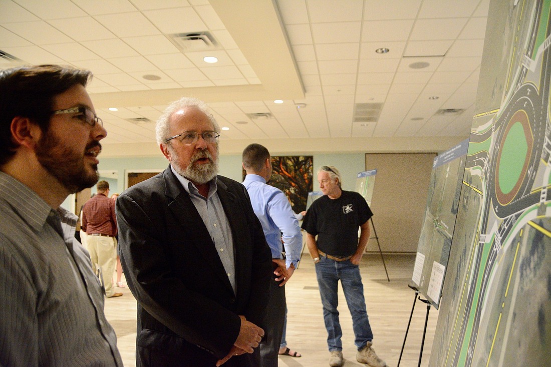 Palm Coast City Councilman Bob Cuff, right, speaks with Don Watson, an engineer with FDOT. (Photo by Jonathan Simmons)