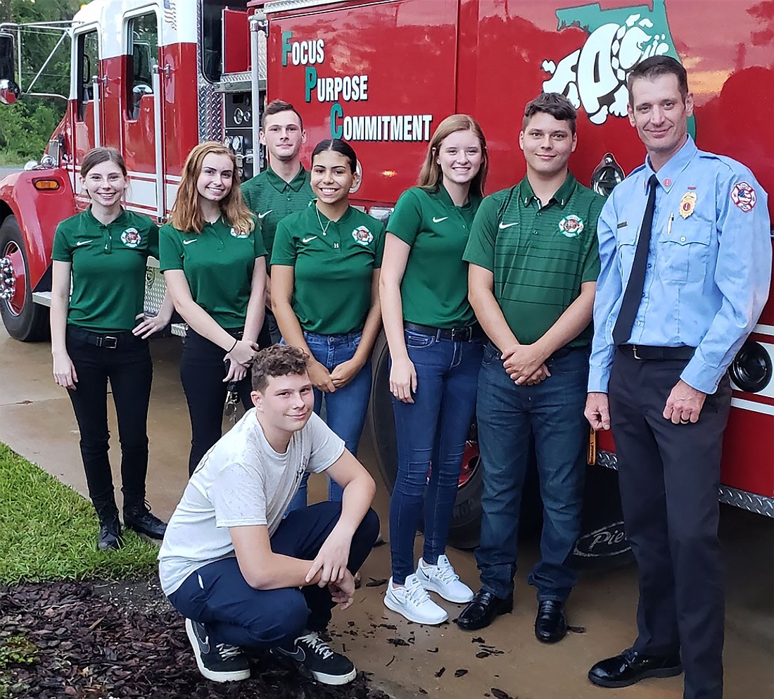 Flagler Fire Rescue Lt. Andrew Keppler and FPC Fire Leadership Academy students Breonna Banks, Ella Linden-Cox, Dylan Cronk, Rosanna Cobo, Sydney Adams, Nicholas Conley and Joshua Cronk. Photo courtesy of the city of Palm Coast