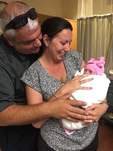 Paul and Danielle Summa welcome their granddaughter, Gracie JoAnn, into the world. Courtesy photo